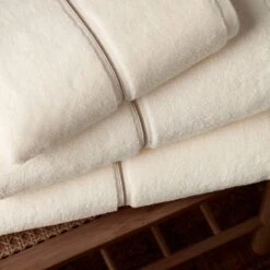 Cream Satin Stitch Bath Towel -Housing Units Furniture Store ac517b60220dff5a39a914e97758f3e8 1