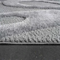 Cleo Wave Blue Textured Rug Collection -Housing Units Furniture Store d1a36404b0996b0ba736efff9e9a4073