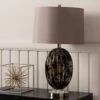 Almond Ribbed Black & Gold Table Lamp With Taupe Shade