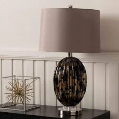 Almond Ribbed Black & Gold Table Lamp With Taupe Shade